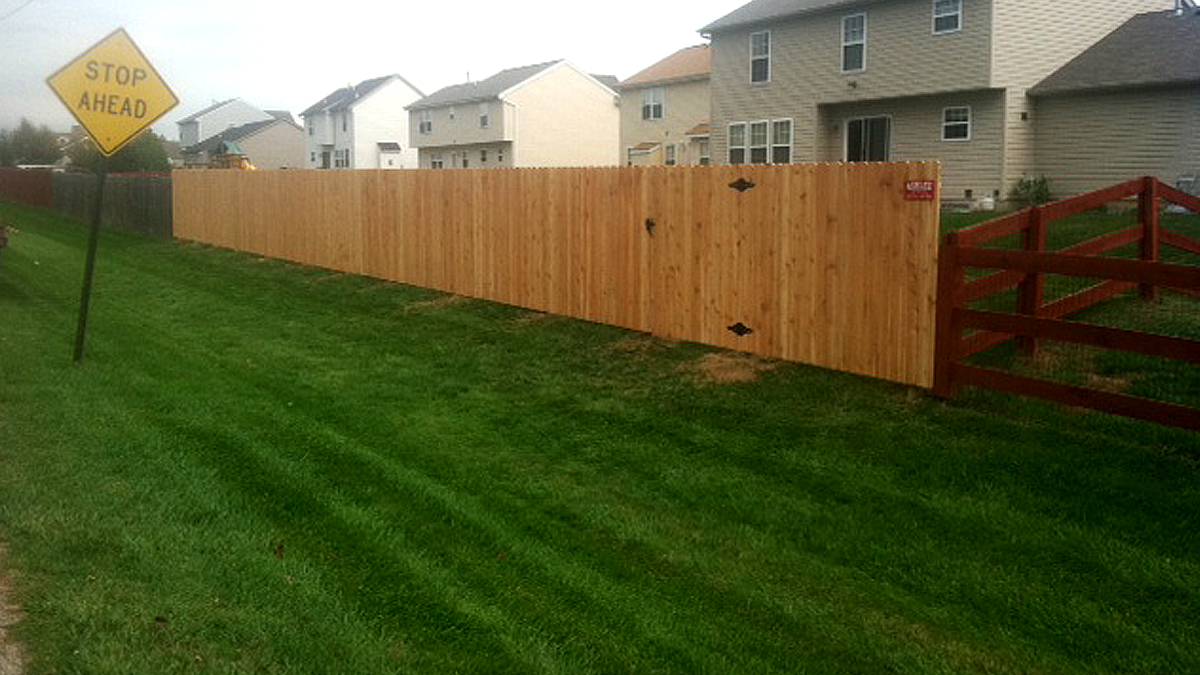 Reclaim your space with a wood privacy fence from Ashlee Fence.