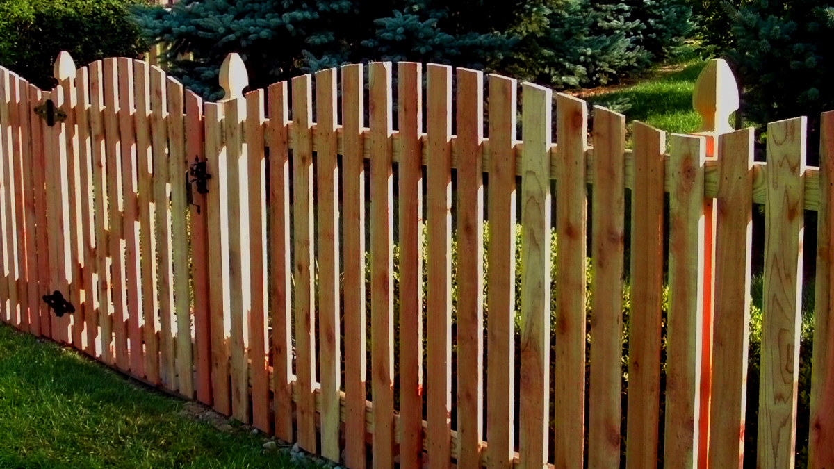 Strong, effective and beautiful. Call us today about a wood fence for your home.
